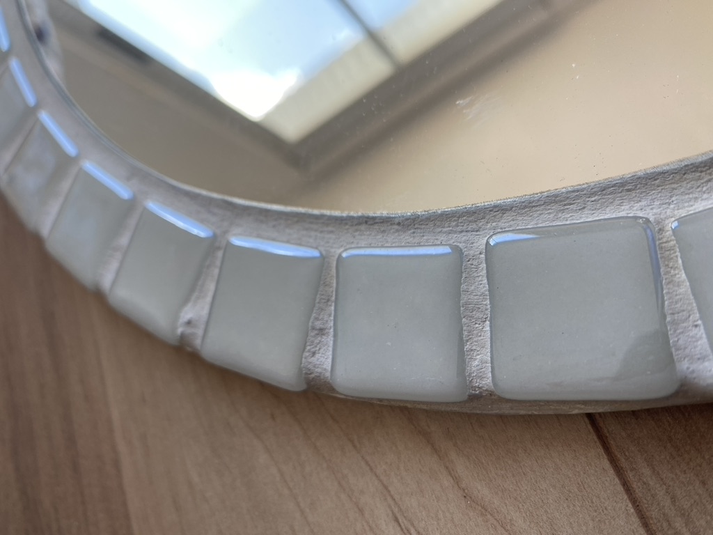 Model wearing plain gray basic tee.